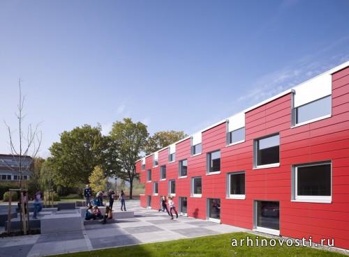 Школьная столовая от SpreierTrenner Architekten. Зальмталь, Германия.