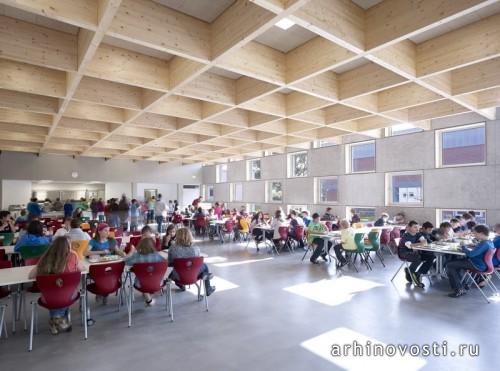 Школьная столовая от SpreierTrenner Architekten. Зальмталь, Германия.