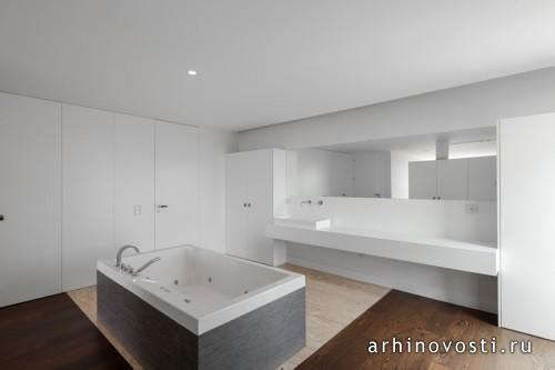 Жилой дом от Estúdio Urbano Arquitectos. Белаш, Португалия.